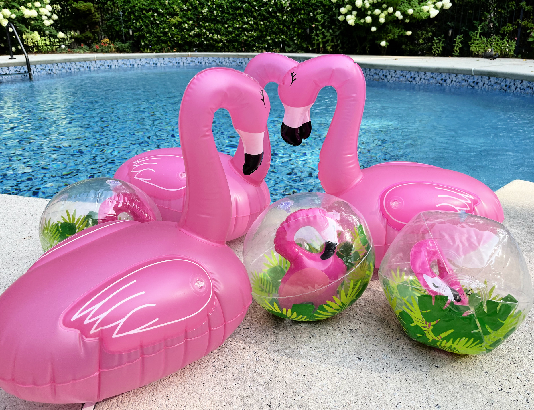 flamingo floats and beach balls