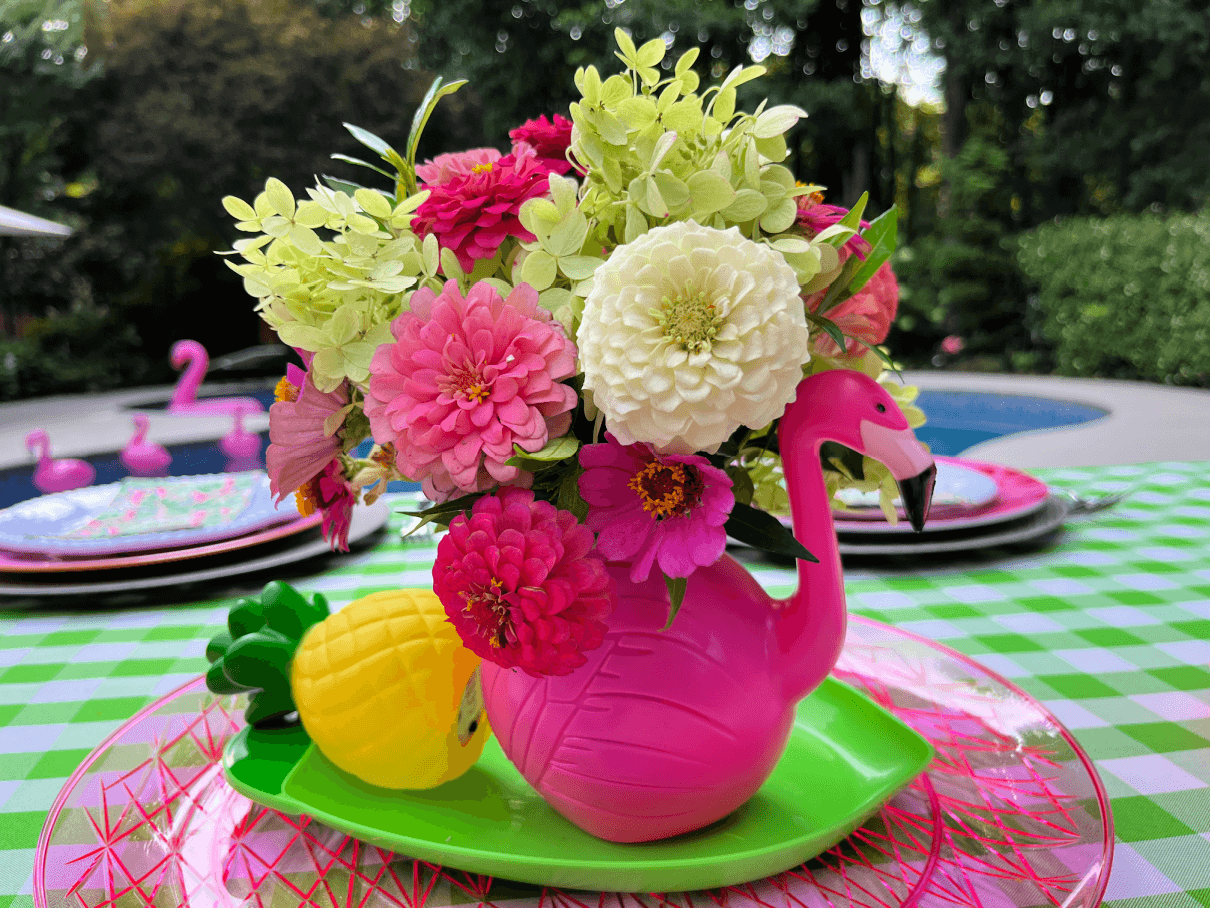 floral flamingo pool party table bouquet