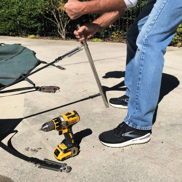 inground pool cover installation using a cordless drill and pool cover tool