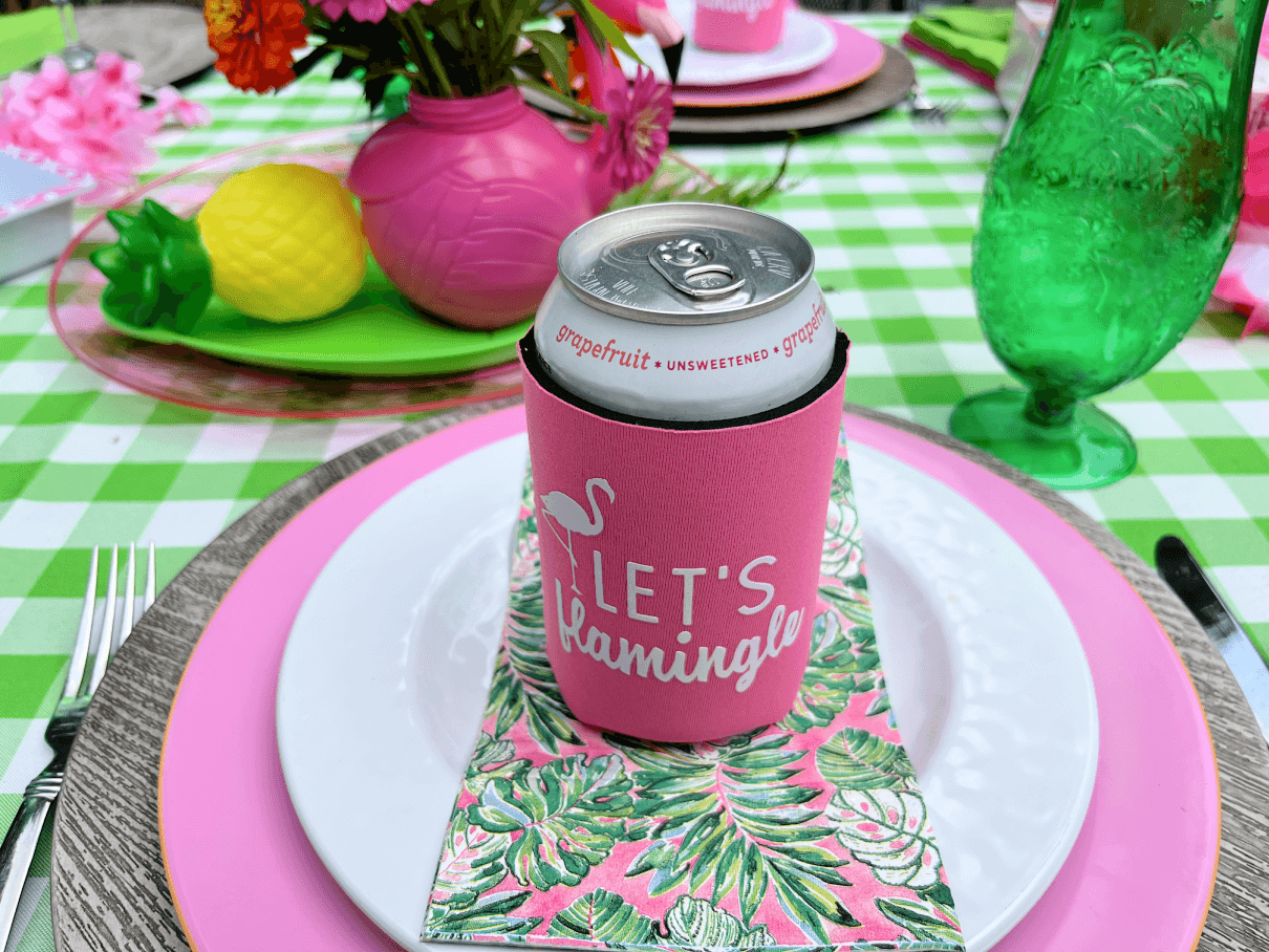 color coordinate your pool party table with colorful plastic dinner plates