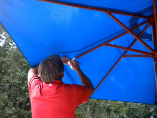 repairing a wood market umbrella